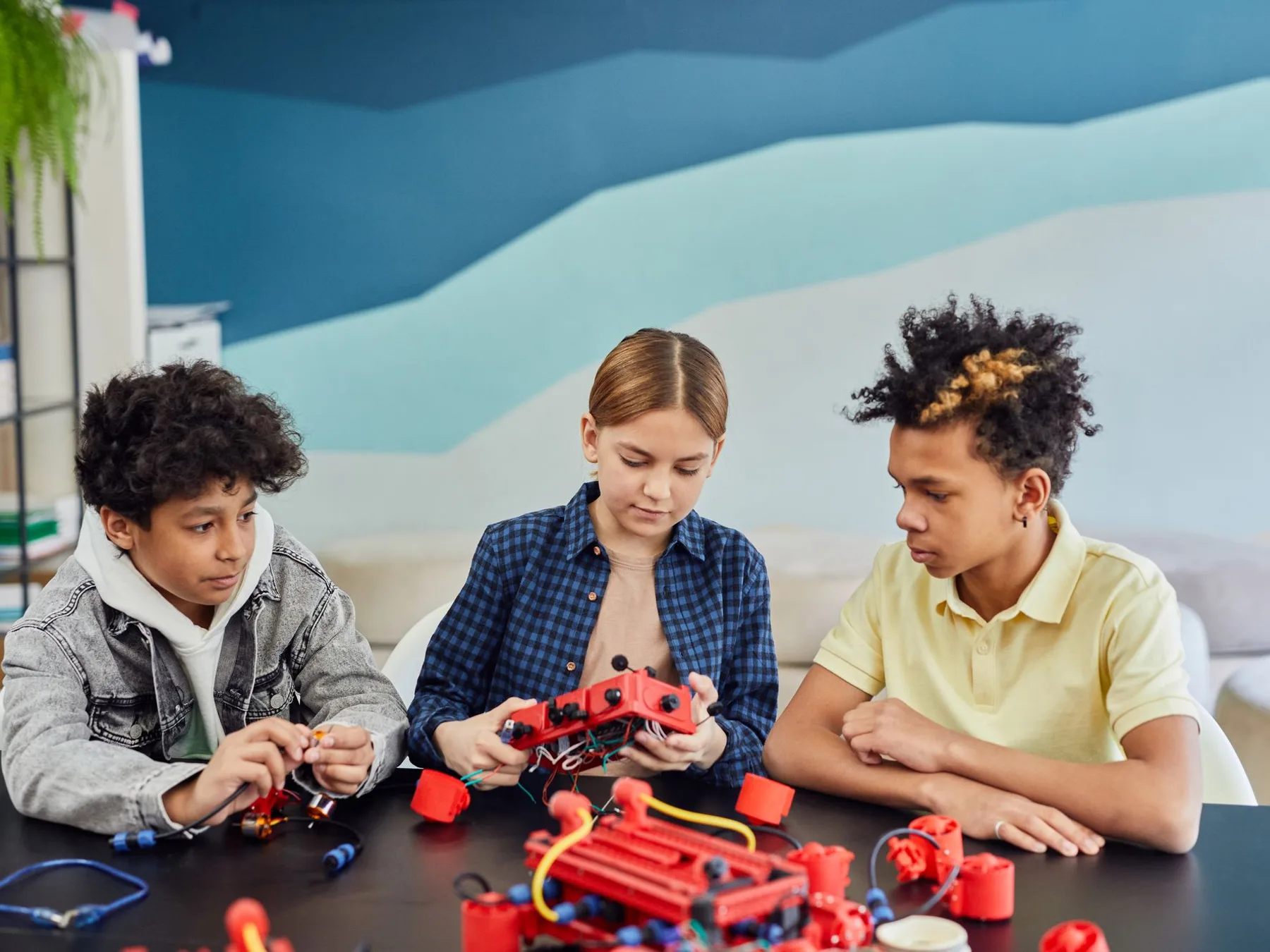 A technical team testing their system at a competition table